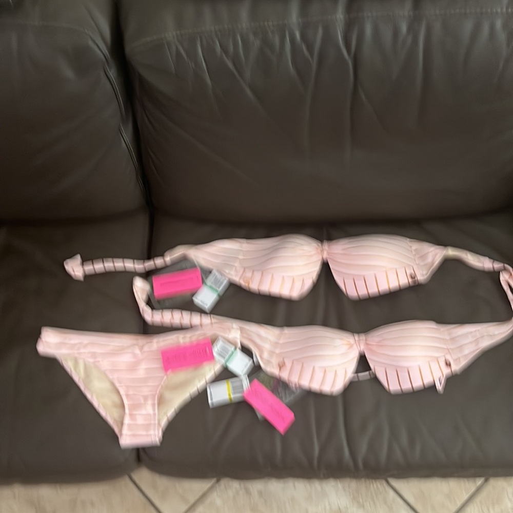 Betsy Johnson bathing suit.Large top, medium top With large bottom.New with tags
